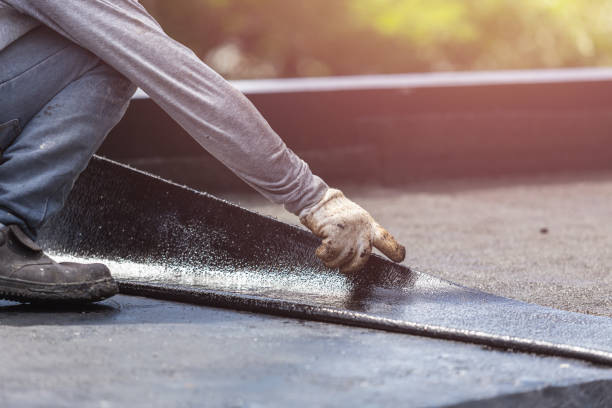 Professional Waterproofing technician working in Notre Dame, IN